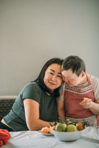 Elderly woman with down syndrome,  asian woman of 40 years. concept of support and relationships