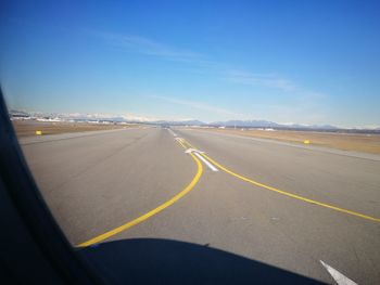 View of airport runway against sky