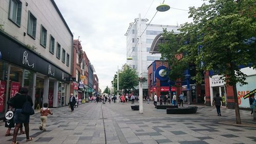 People walking on city street