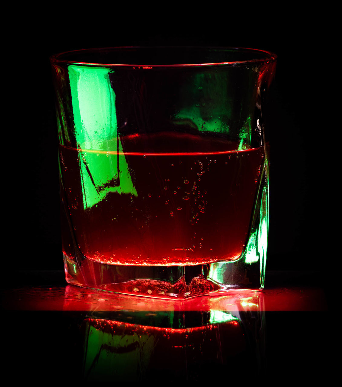 CLOSE-UP OF DRINK IN GLASS