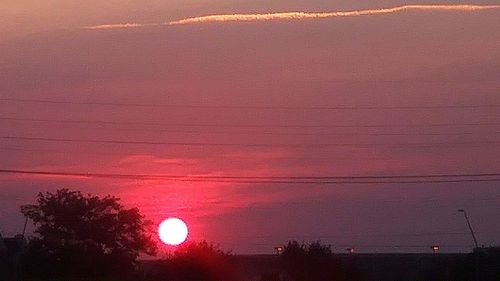 Low angle view of dramatic sky during sunset