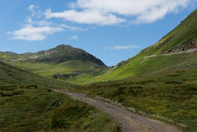 Scenic view of mountain road against sky