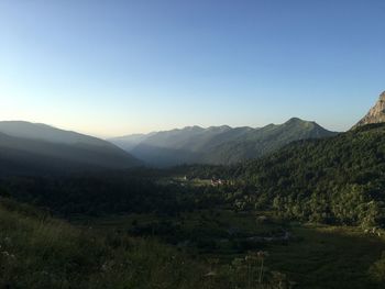 Scenic view of mountains against clear sky