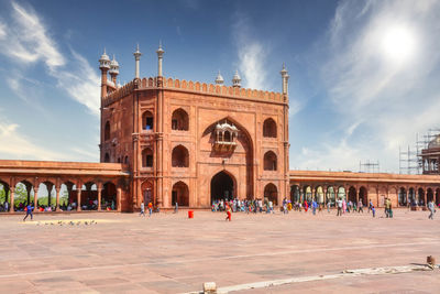 Group of people in front of historical building