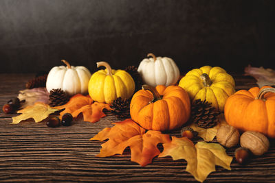 Close-up of pumpkins on table during autumn