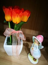 Close-up of flower vase on table