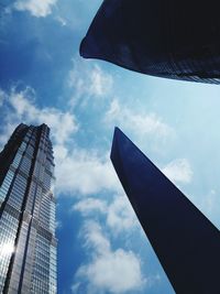 Low angle view of skyscrapers against sky