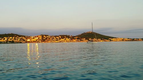 Scenic view of sea against sky at sunset