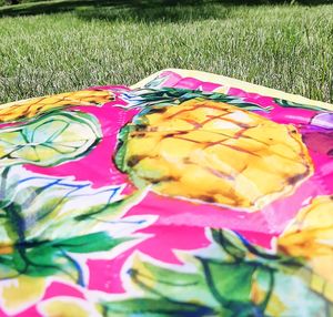 High angle view of multi colored candies on field