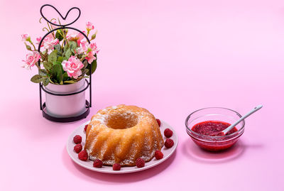 Close-up of pink flowers on table