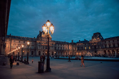 Buildings in city at night