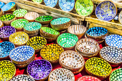 Full frame shot of multi colored bowls for sale