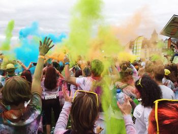 People playing with colored powder during holi