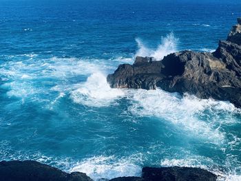 Scenic view of rocks in sea