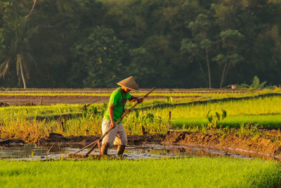 Man working on field