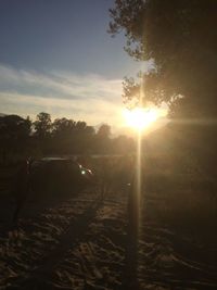 Scenic view of landscape against sky during sunset