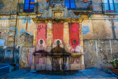 Graffiti on old building wall