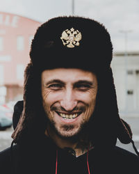 Close-up portrait of smiling young man