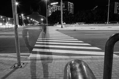 Double exposure of men crossing road