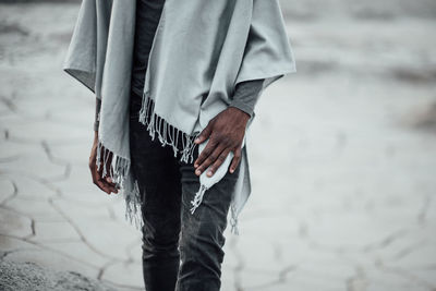 Low section of man walking outdoors