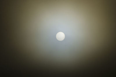 Low angle view of moon against sky at night