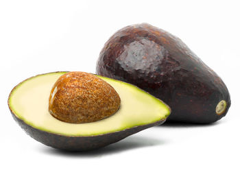 Close-up of fruits against white background