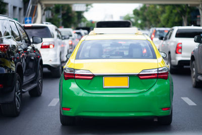 Close-up of car on street