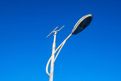 Low angle view of street lamp against clear sky