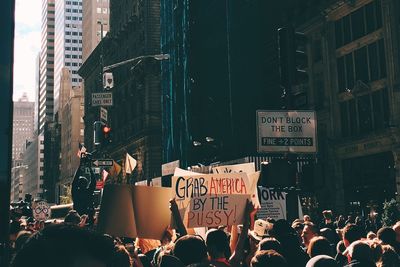 Protestors with placards in city