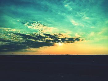 Scenic view of silhouette landscape against sky during sunset