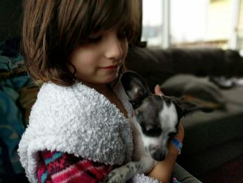 Cute boy looking away at home