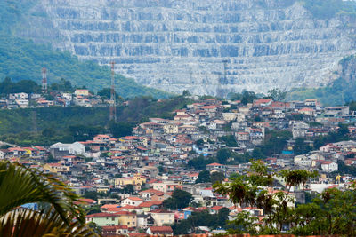 High angle view of townscape and trees in city