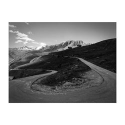 Scenic view of mountain road against sky