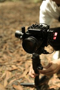 Close-up of camera photographing