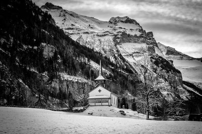 Scenic view of mountains against sky during winter