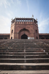 Low angle view of steps against sky