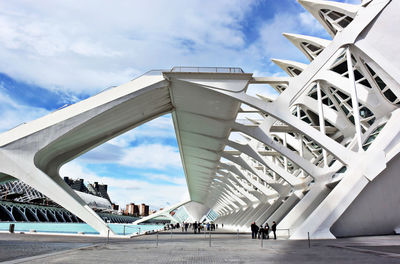 People walking under famous architecture in valencia