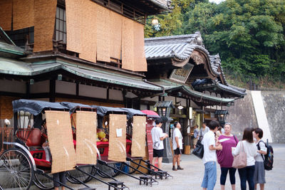 People in front of building