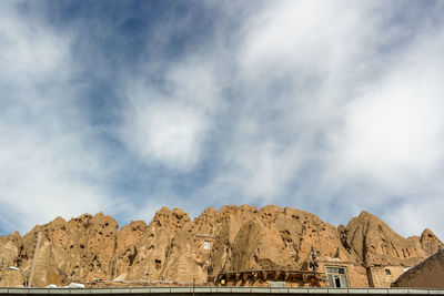 Panoramic view of rocky mountains against sky