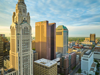 Buildings in city against sky