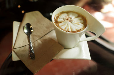 Tasty coffee cup on table for food and drinks backgrounds