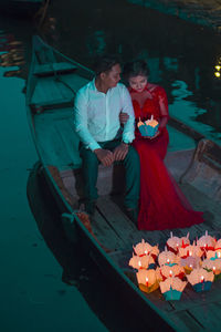 High angle view of man standing in boat