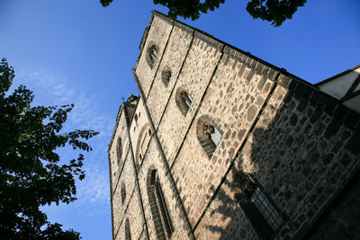 Low angle view of old building against sky