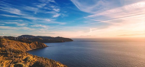 Scenic view of sea against sky during sunset