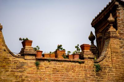 Low angle view of old building against clear sky
