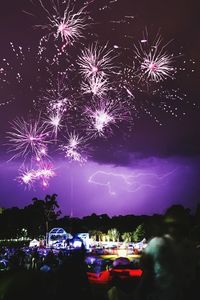 Firework display at night