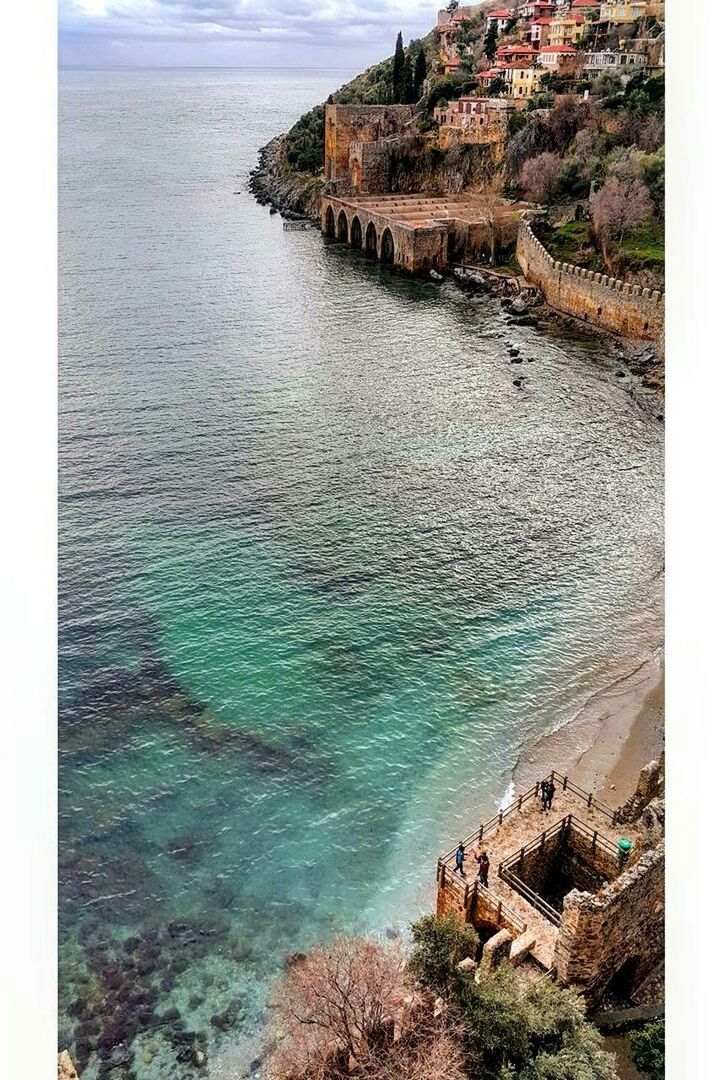 water, sea, scenics, nature, tranquility, high angle view, beauty in nature, beach, day, tranquil scene, outdoors, coastline, tree, sky, no people, horizon over water, reservoir