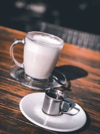 Close-up of coffee cup on table