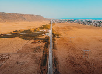 Scenic view of desert against clear sky