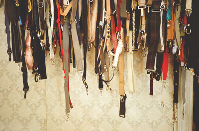 Close-up of clothes hanging on wall